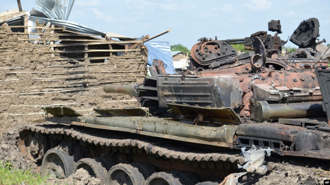 FILE - Tanks destroyed during fighting between forces of Salva Kiir and Riek Machar, on July 10, 2016 in Jabel area of Juba, South Sudan.