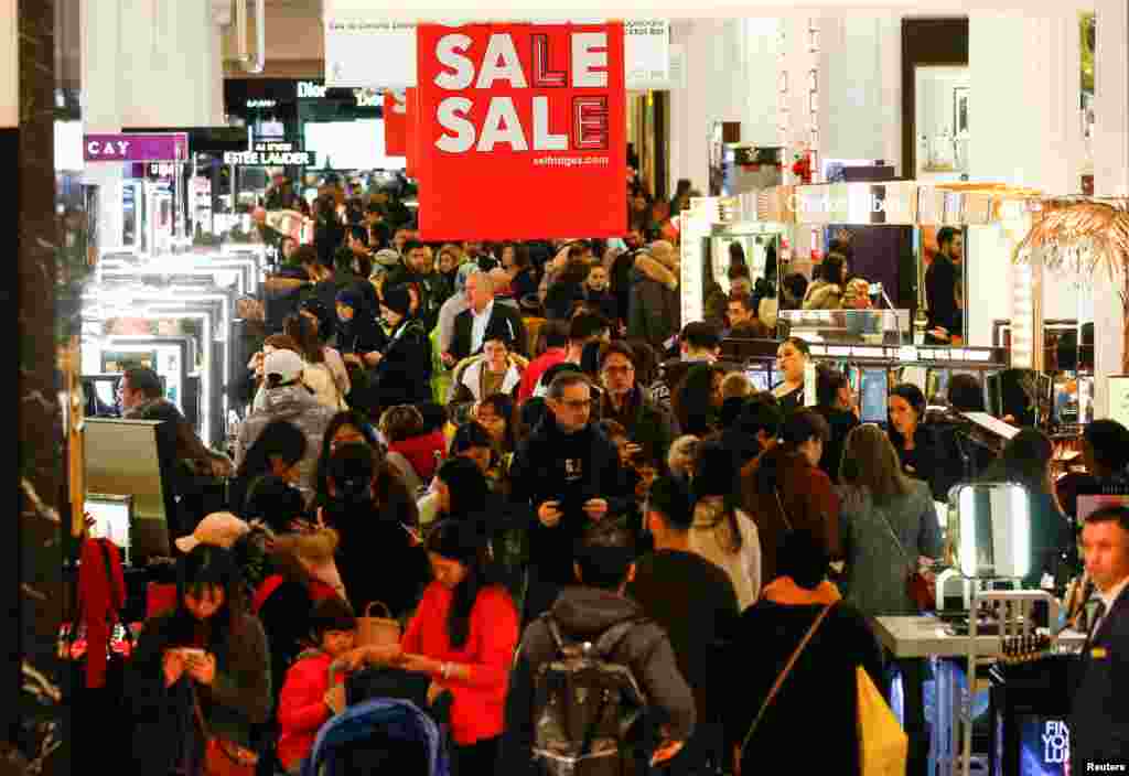 Shoppers are seen inside the Selfridges store on Oxford Street during the Boxing Day sales in central London.
