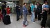 Una mujer embarazada de Honduras es liberada de la detención con otros inmigrantes indocumentados en una estación de autobuses en McAllen, Texas, el 28 de julio de 2018.