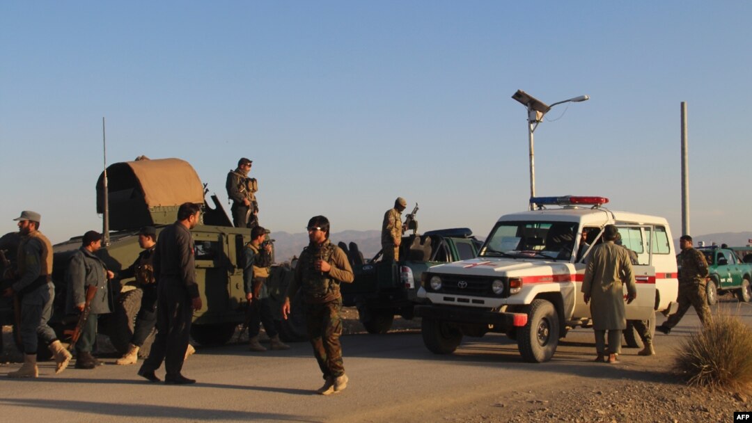 Afghan security force arrive near the site after a suicide bomber blew himself up inside a packed mosque on an Afghan army base in Khost province, Nov. 23, 2018.