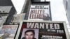 A video display showing suspects wanted by the FBI in New York's Times Square