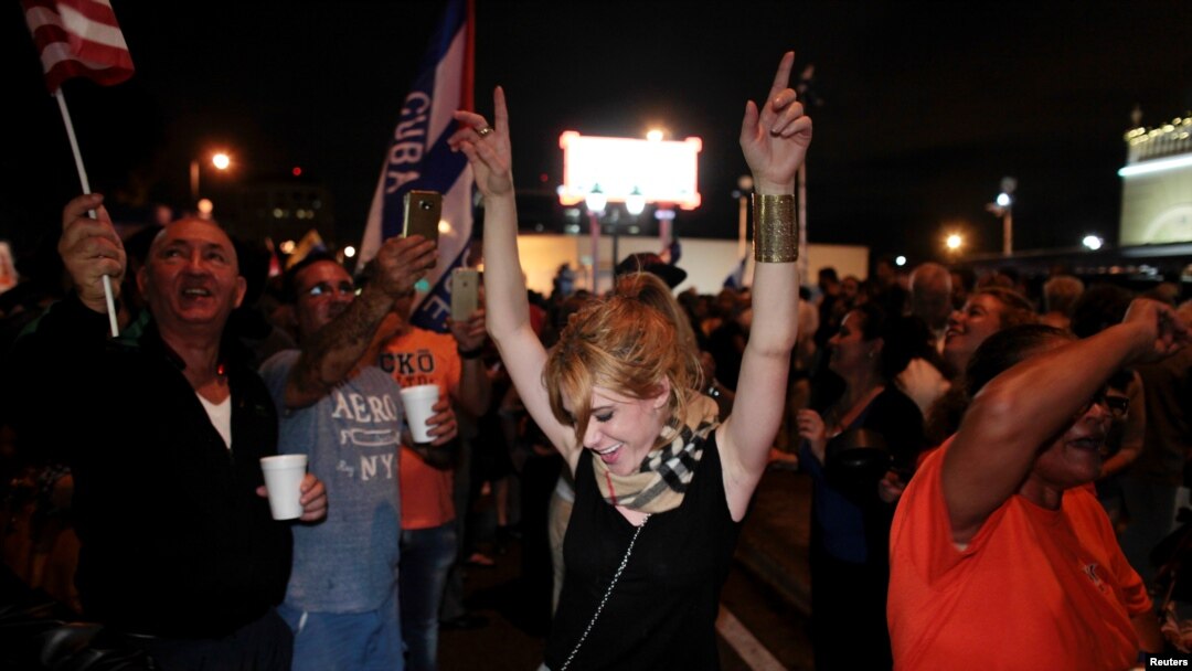 People celebrate after the announcement of the death of Cuban revolutionary leader Fidel Castro in the Little Havana district of Miami, Florida, U.S. November 26, 2016. 
