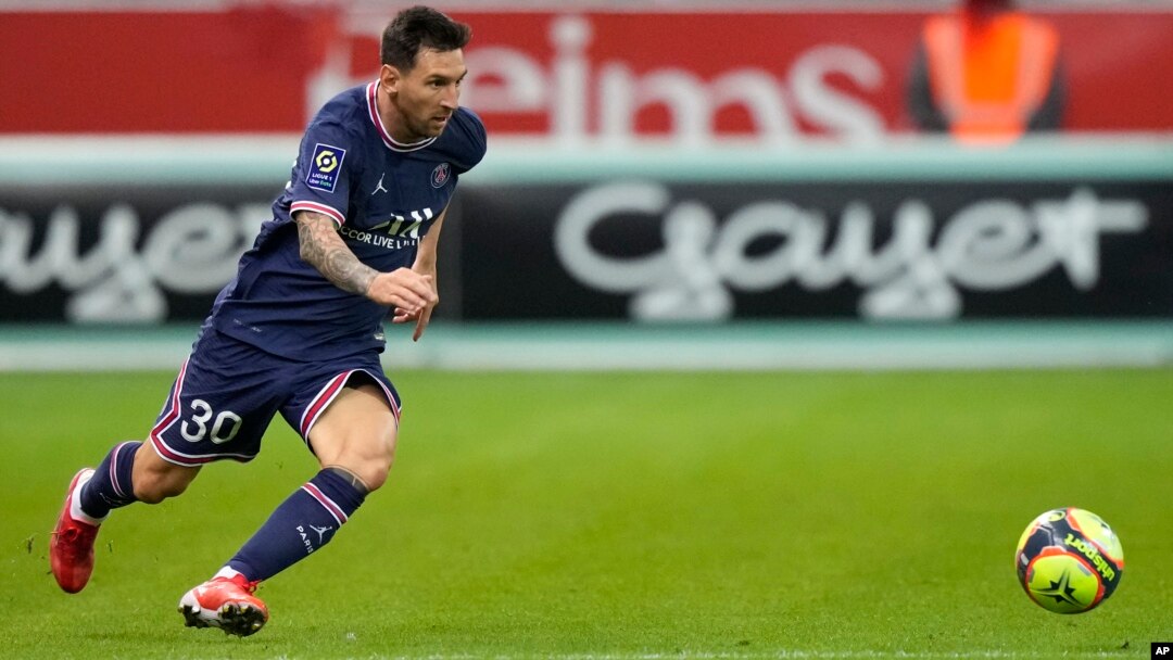 Messi a lokacin wasansu da Reims.