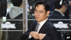 FILE - Lee Jae-yong, a vice chairman of Samsung Electronics Co., arrives for a hearing at the National Assembly in Seoul, South Korea, Tuesday, Dec, 6, 2016.