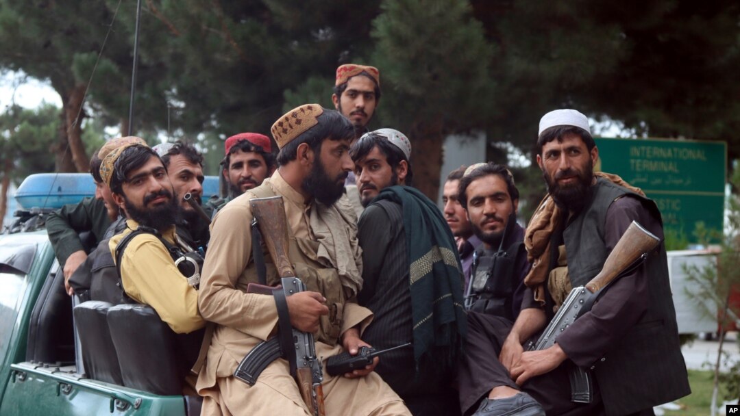 Taliban fighters arrive inside the Hamid Karzai International Airport after the U.S. military's withdrawal, in Kabul, Afghanistan, Aug. 31, 2021.
