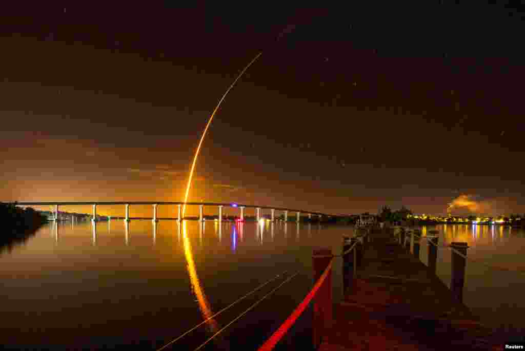 A SpaceX Falcon 9 rocket, carrying the Crew Dragon spacecraft, lifts off on an uncrewed test flight to the International Space Station from the Kennedy Space Center as viewed in Vero Beach, Florida, March 2, 2019.