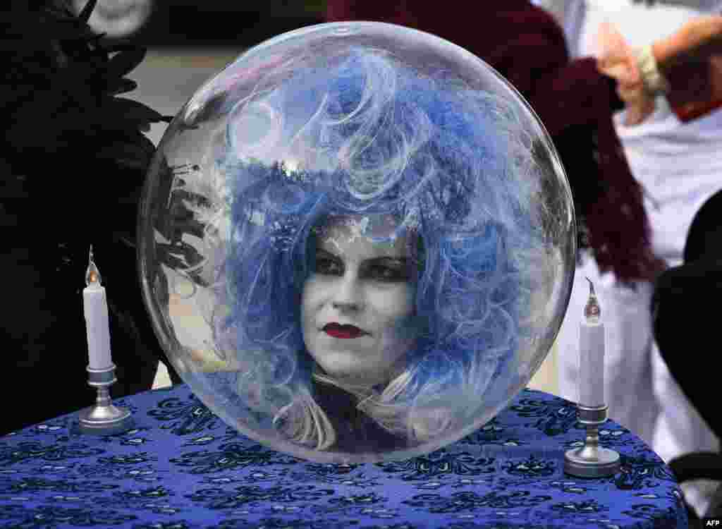 A woman wears a costume at the annual Haute Dog Howl'oween parade in Long Beach, California, Oct. 28, 2018.