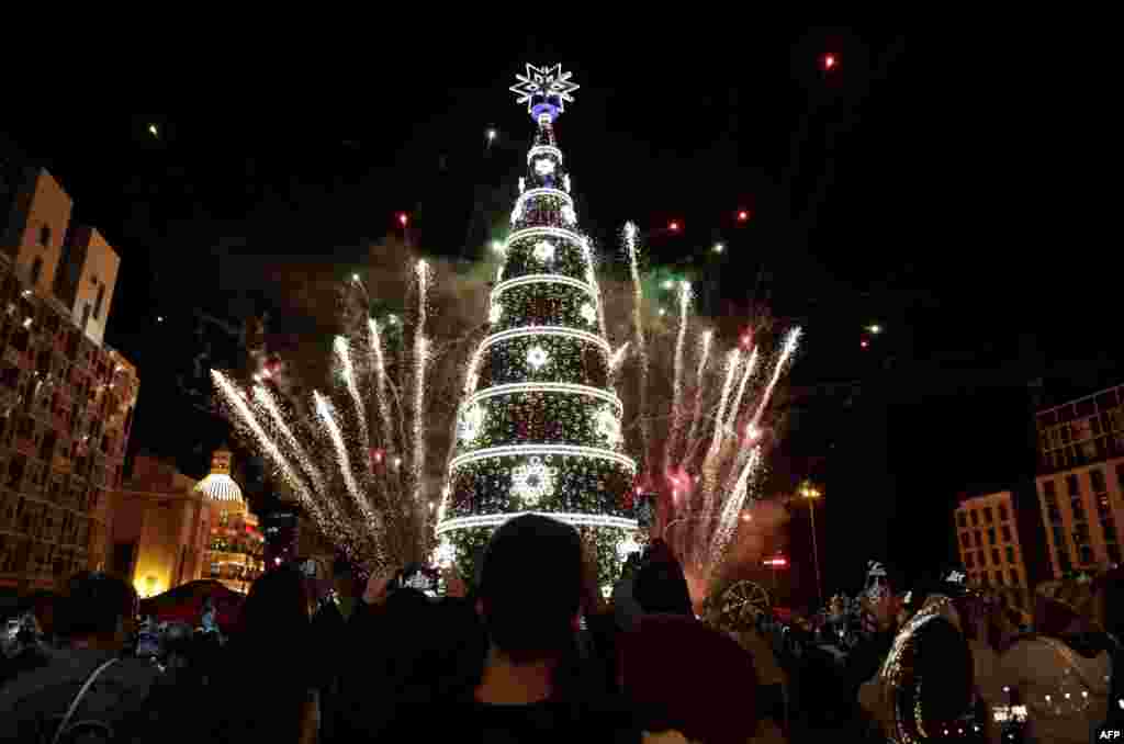 Fireworks light the sky as a Christmas tree is lit in Lebanon's capital Beirut.