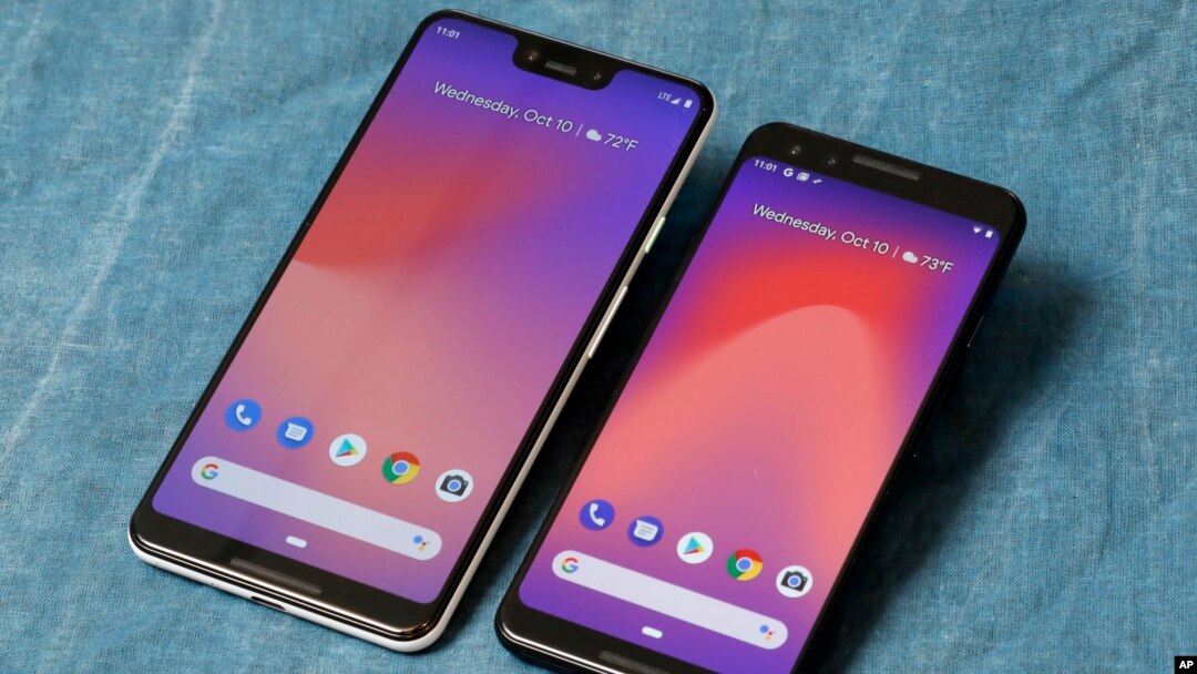The Google Pixel 3 XL, left, and Google Pixel 3 smartphones are shown in this photo, in New York, Wednesday, Oct. 10, 2018. (AP Photo/Richard Drew)